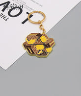 Genshin Impact Zhongli Merch: Planet Befall Keychain & Pin Badge